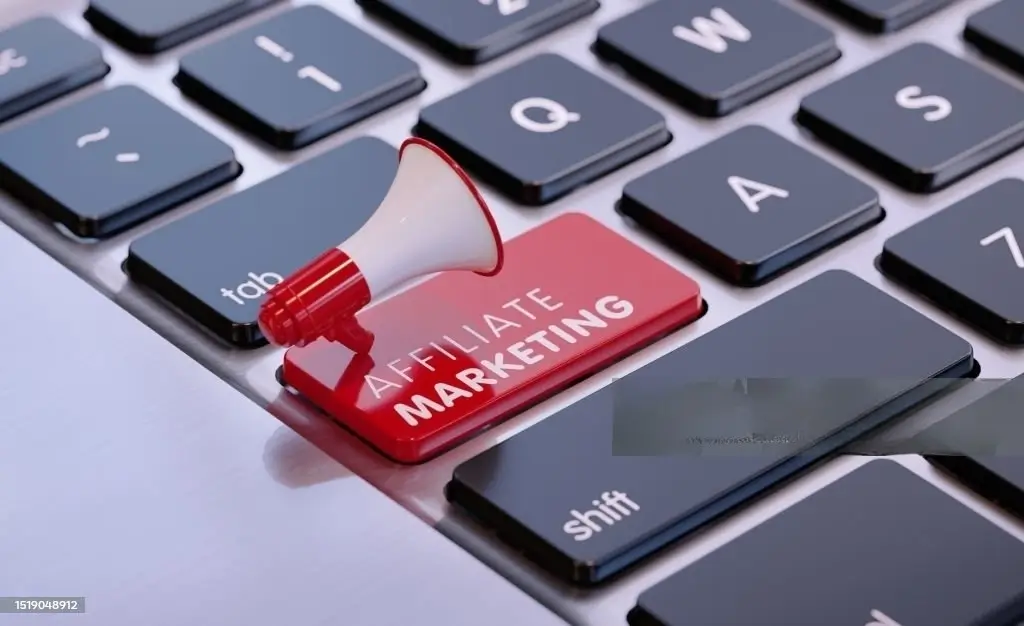 Red megaphone on affiliate marketing written computer keyboard. Horizontal composition with copy space