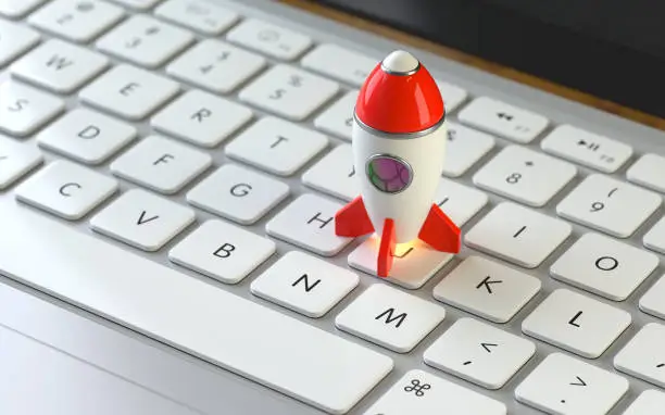 rocket on the keyboard of a latop